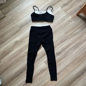Black and white workout set leggings and sports bra from gold hinge